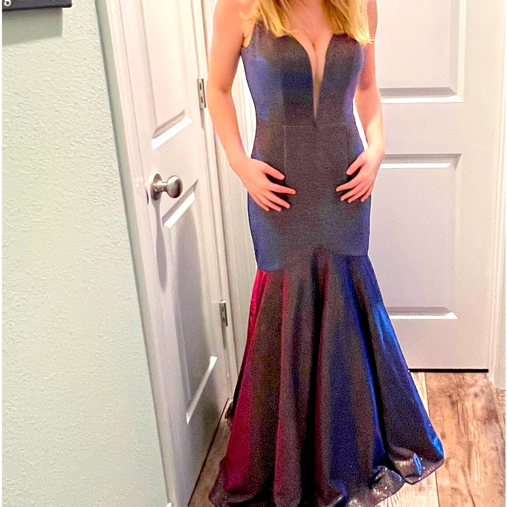 Beautiful prom dress size 4. Comes with matching bow tie